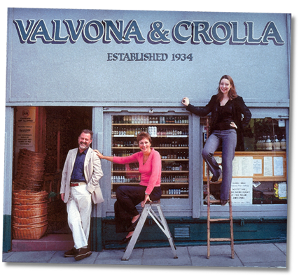 Philip, Mary and family at the ladder beneath the Valvona & Crolla Established 1934 fascia
